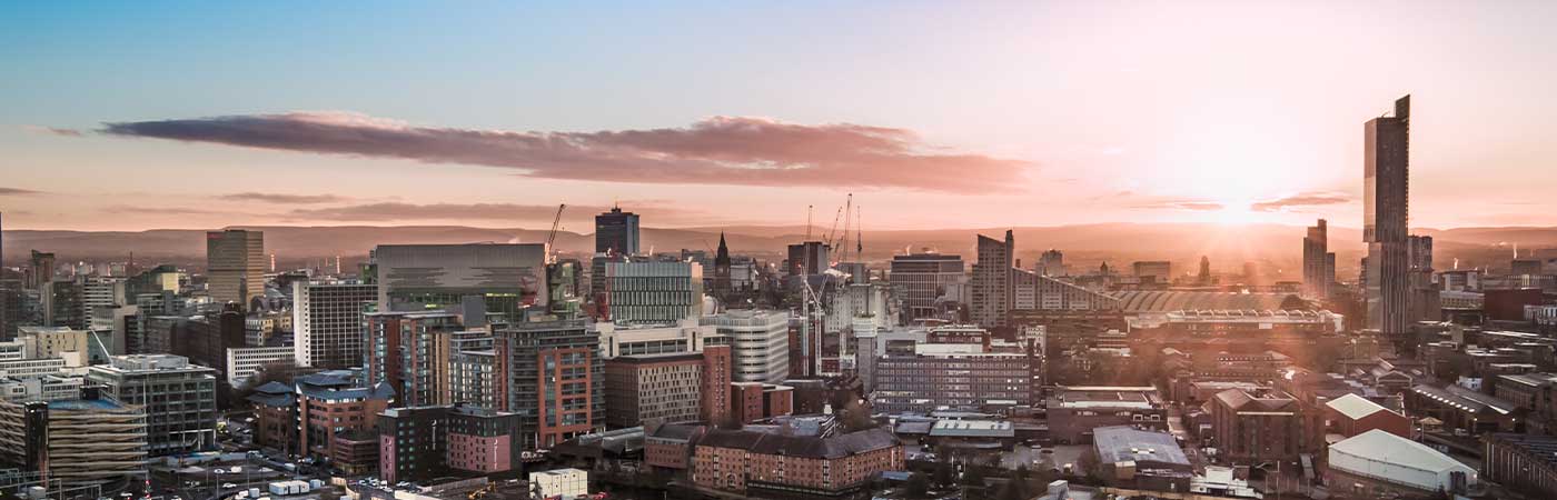 The cityscape of Manchester during sunset